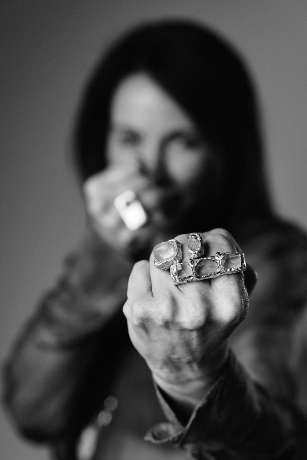 Ana-Lucia pointing at the camera, wearing a chunky silver ring