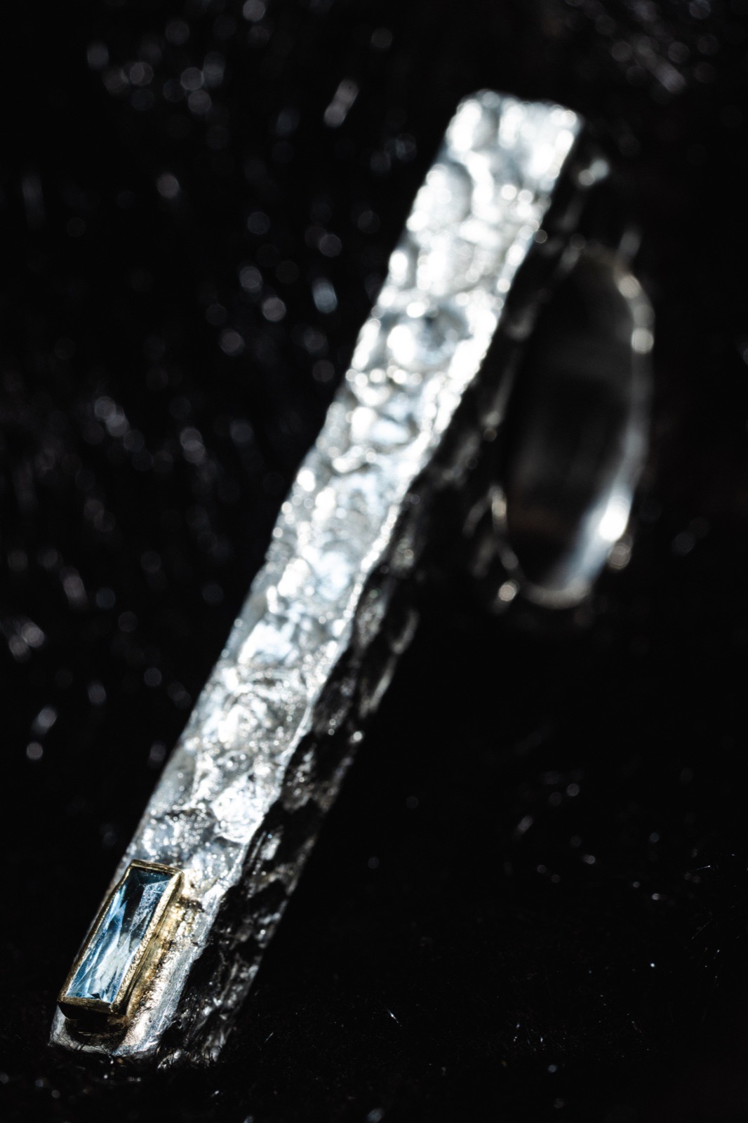 Long ring with square gem