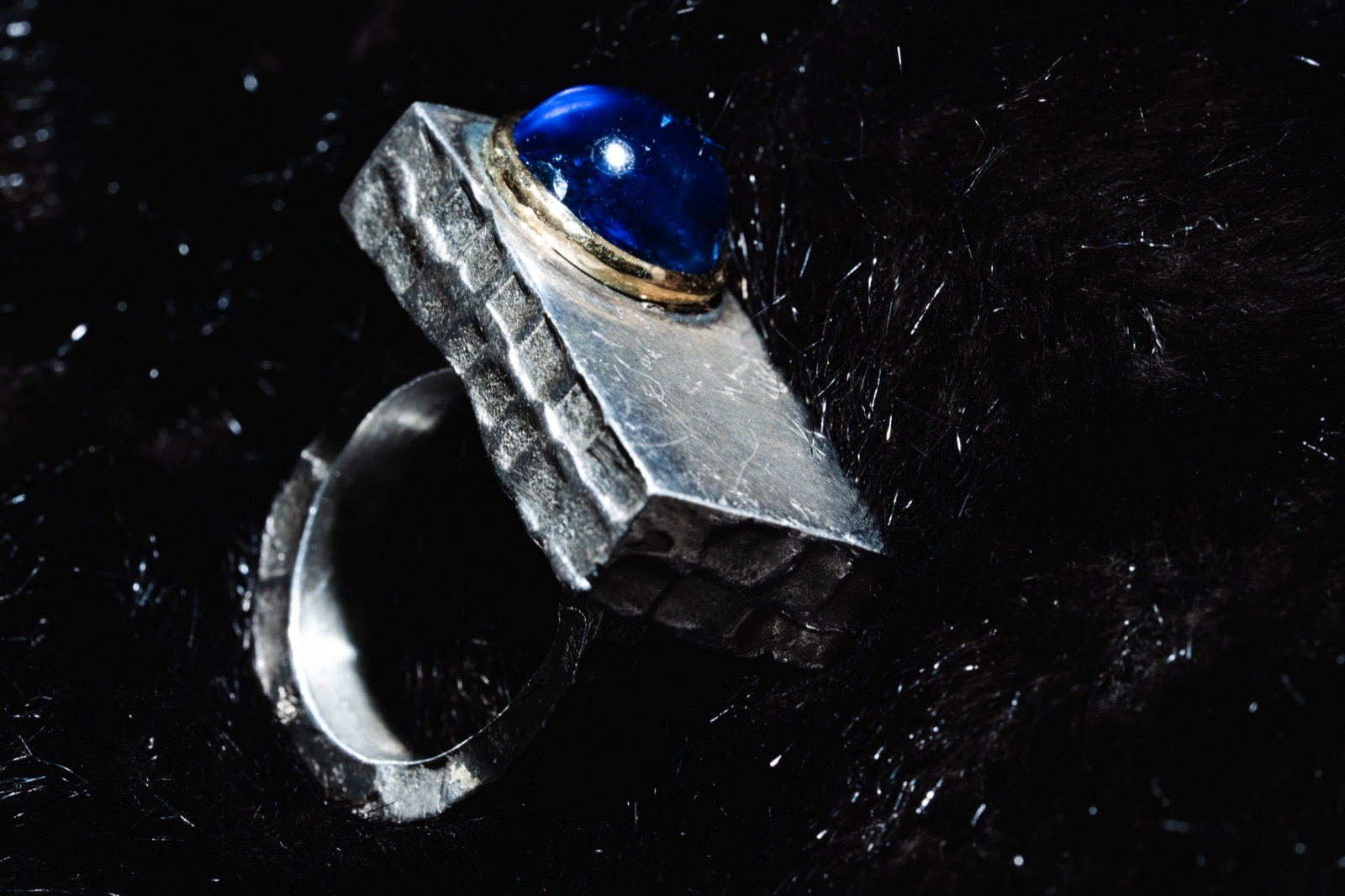 Silver ring with a blue cabochon stone