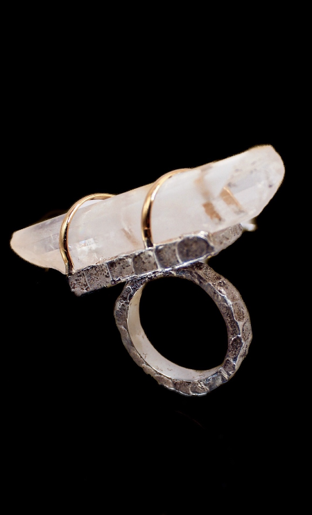 Silver ring with a long quartz crystal and gold wire wraps, product shot
